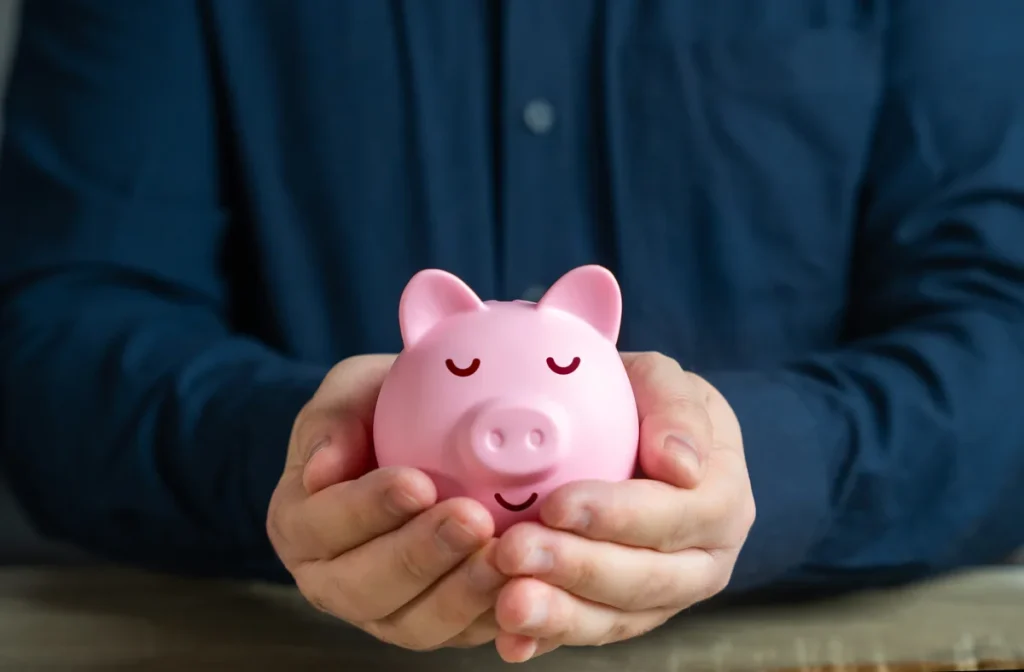 Man holding a piggybank