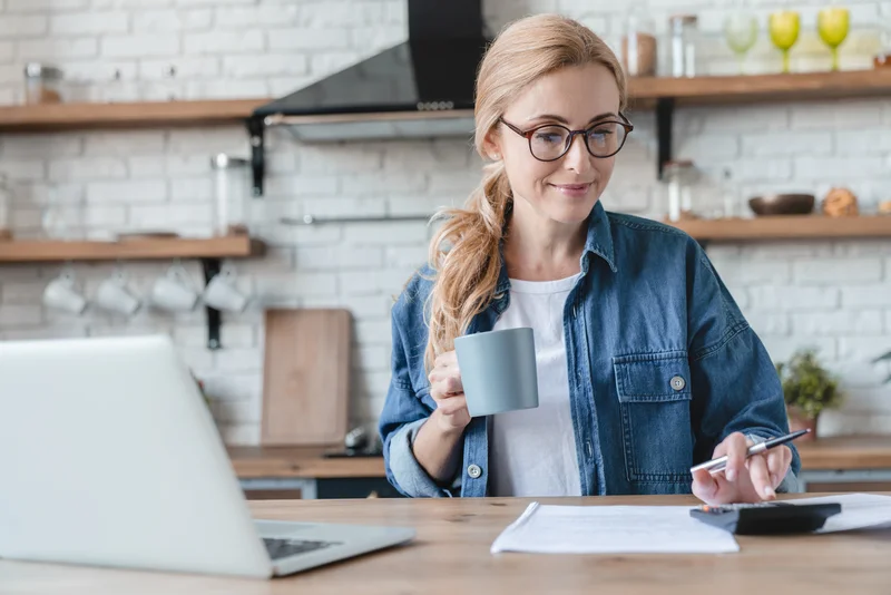 Woman using a calculator